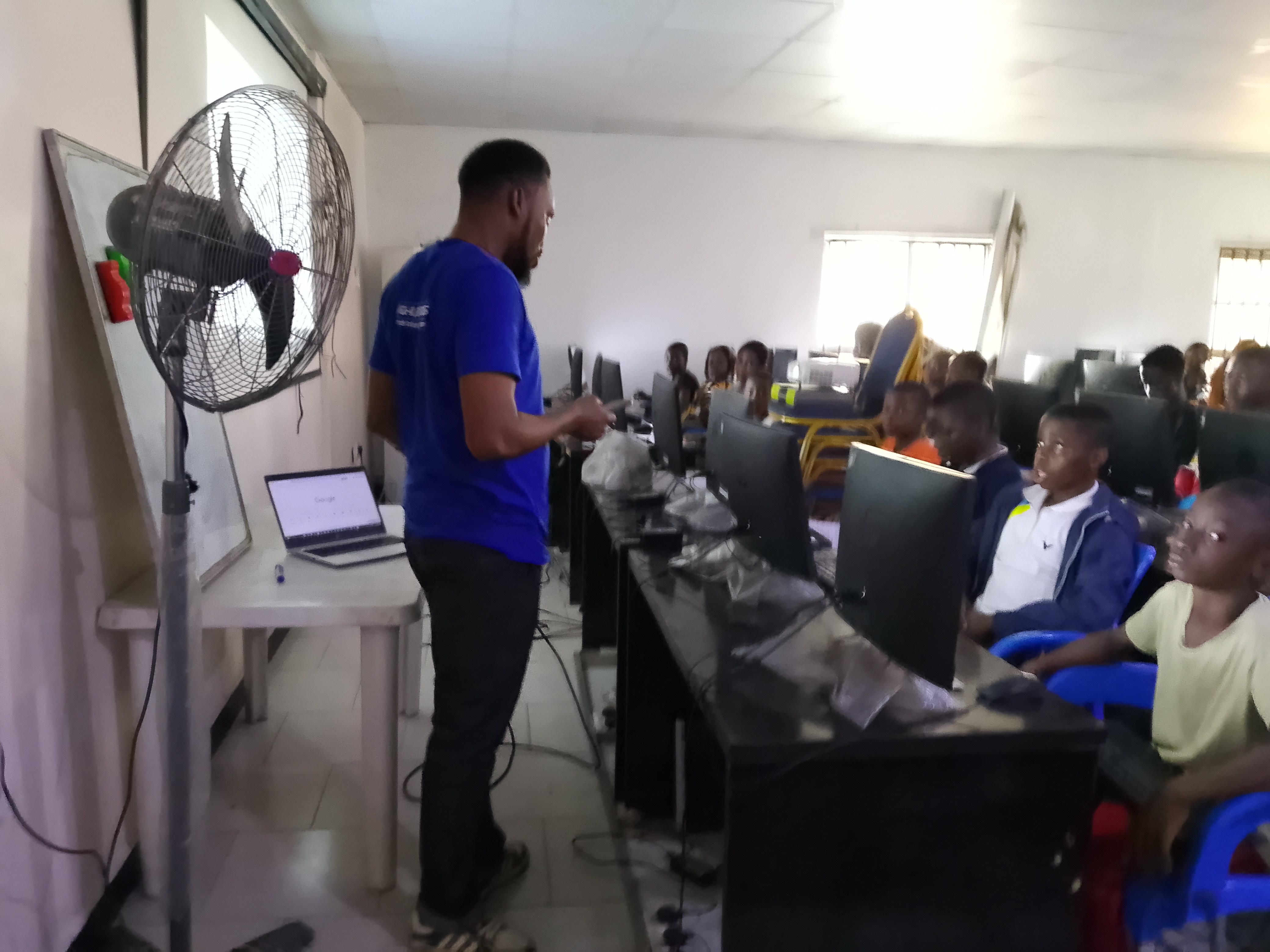 Young students learning AI video creation and digital skills in the lab